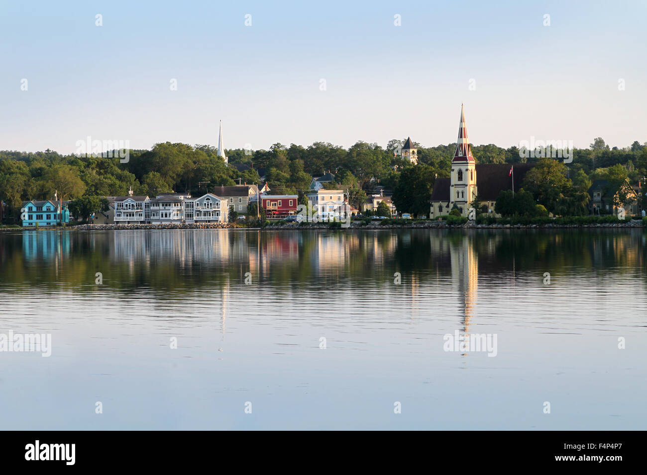 Mahone Bay, Nova Scotia, Canada, a small rural coastal town showing it's church spires and reflections along the water Stock Photo