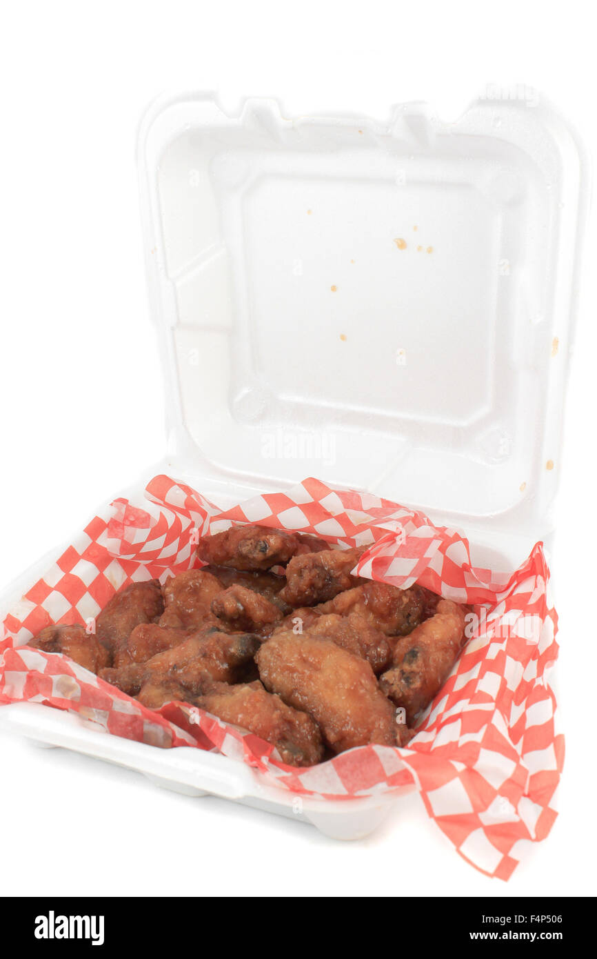 Take out thai chilli chicken wings in package on a white background Stock Photo