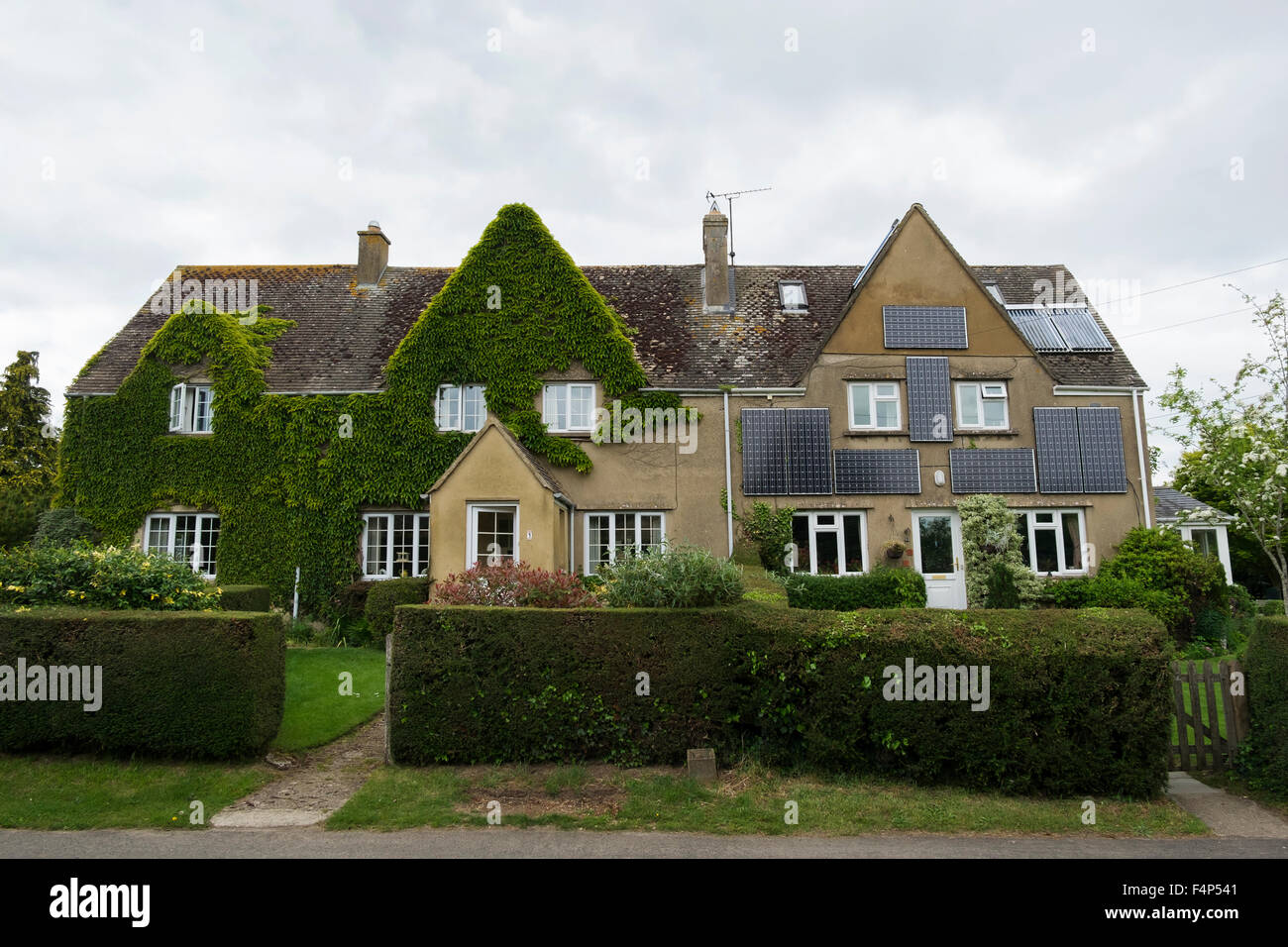 Semi detached house with solar panels on the front in the Cotswolds, Gloucestershire, UK Stock Photo