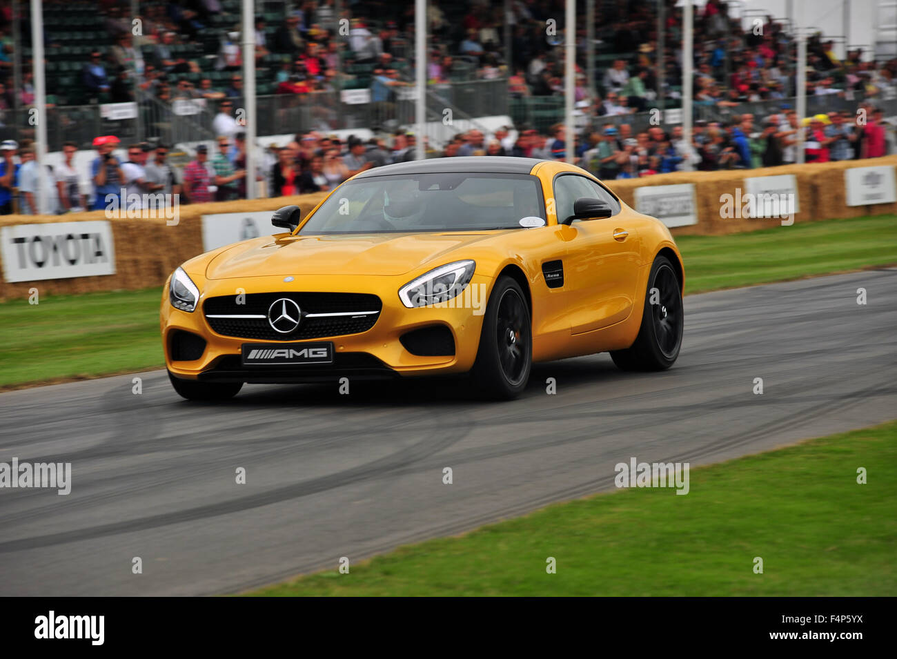 A yellow Mercedes-AMG GT S at the Goodwood Festival of Speed in the UK. Stock Photo