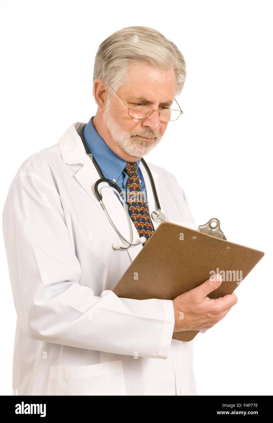 A doctor taking notes on a clipboard Stock Photo