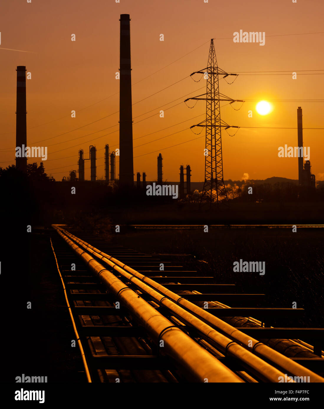 Oil refinery at sunset Stock Photo