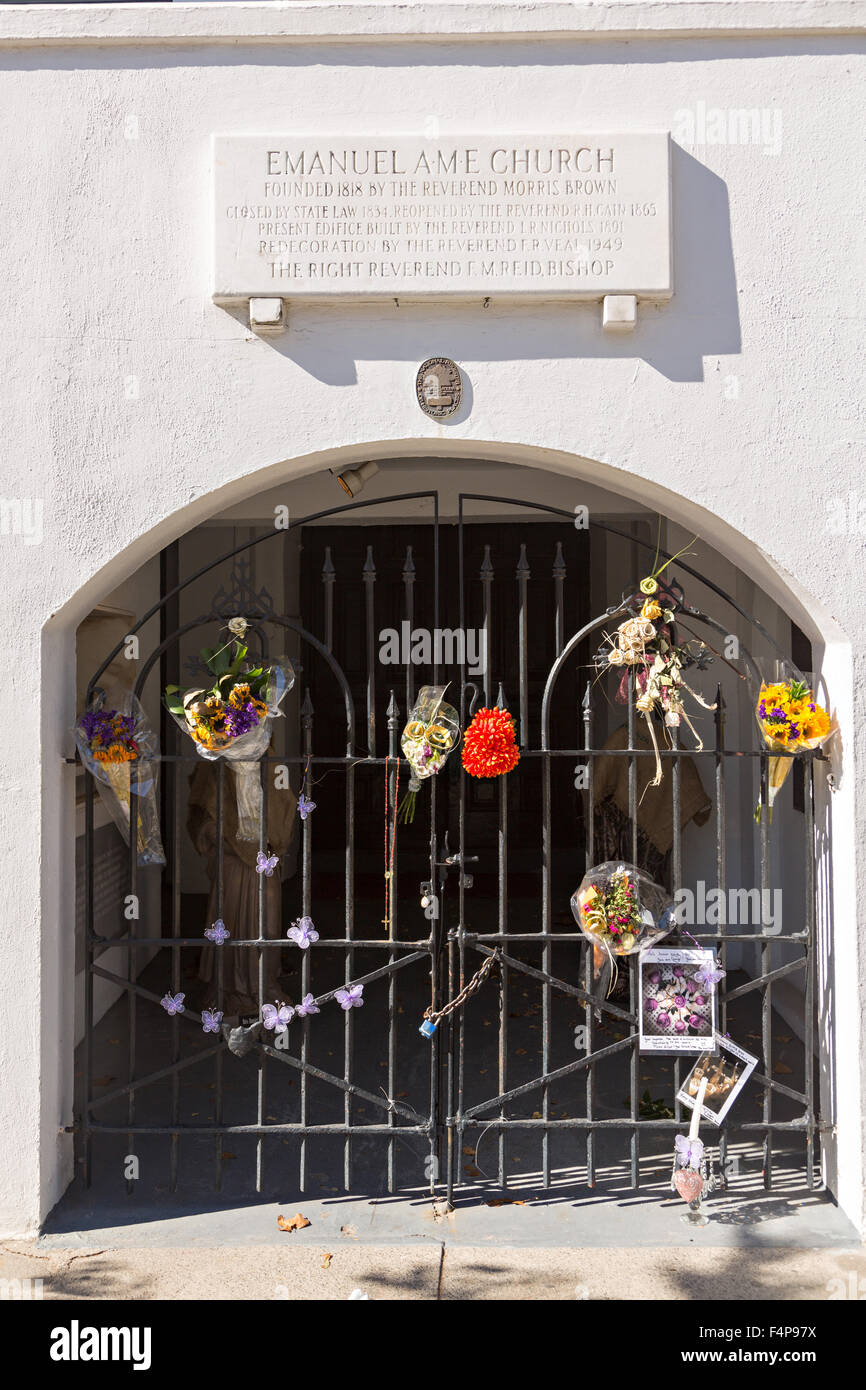 A few flowers and note attached to the gate at the historic Mother Emanuel African Methodist Episcopal Church October 21, 2015 in Charleston, South Carolina. The church was the site of the mass shooting that killed nine-people in June 2015. Stock Photo