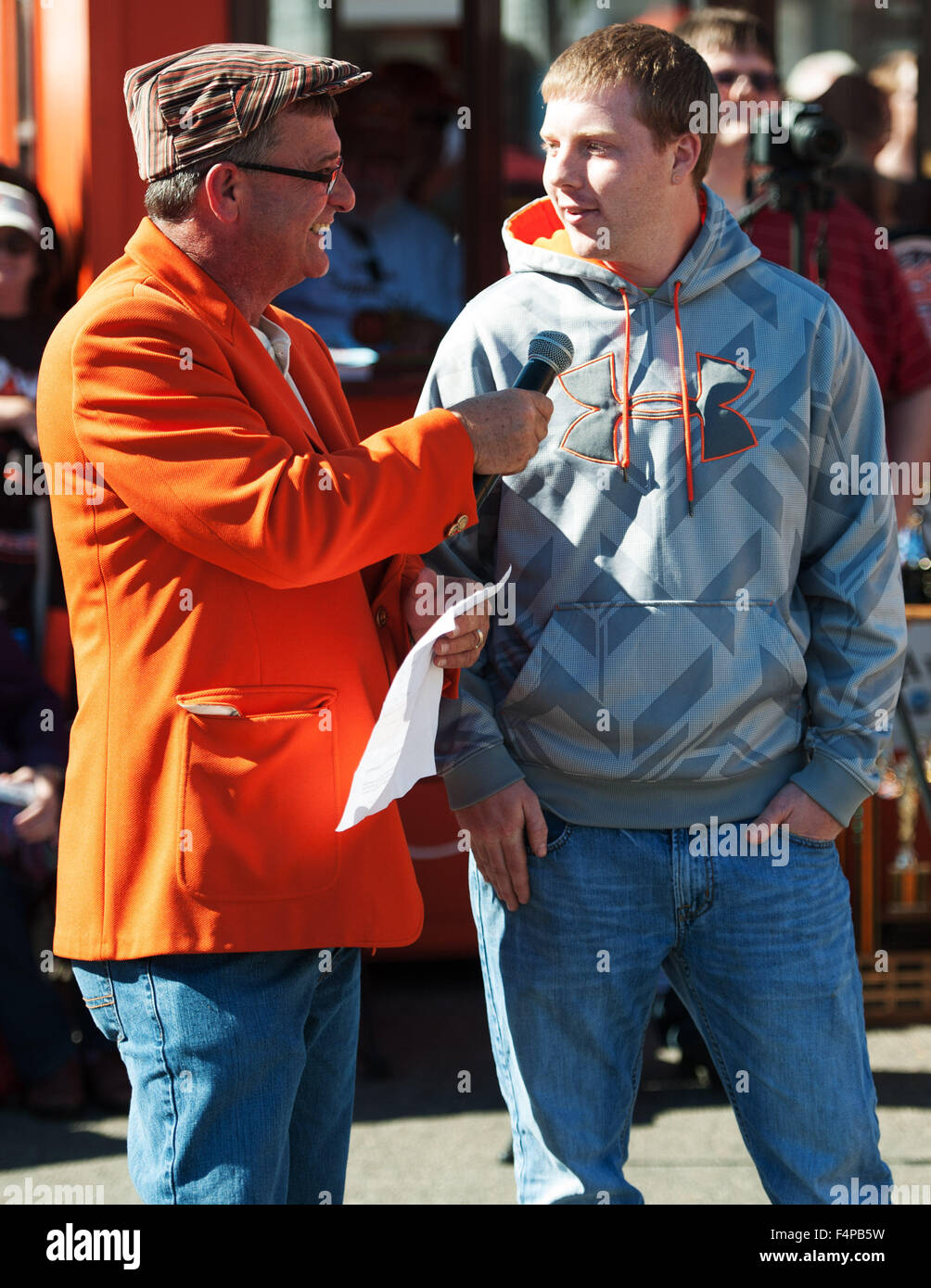 Circleville, Ohio, USA. 21st Oct, 2015. Rusty Ortman being interviewed by Ernie Weaver at the 109th Annual Circleville Pumpkin Show in Circleville, Ohio. Credit:  Brent Clark/Alamy Live News Stock Photo