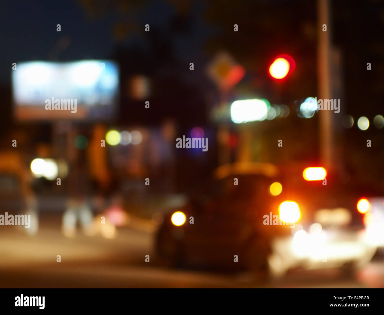 Abstract night scene with dim lights and headlights. Blur and defocused  lights from the headlights of cars and traffic lights ca Stock Photo - Alamy