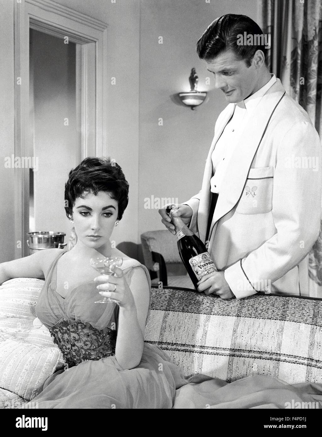 Elizabeth Taylor, Roger Moore / The Last Time I Saw Paris 1954 directed by Richard Brooks Stock Photo