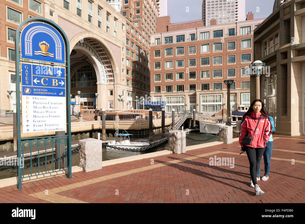 People Doing The Boston Harborwalk At Rowes Wharf Boston Stock