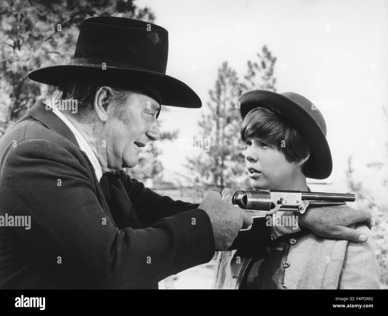 John Wayne, Kim Darby / True Grit 1969 directed by Henry Hathaway Stock