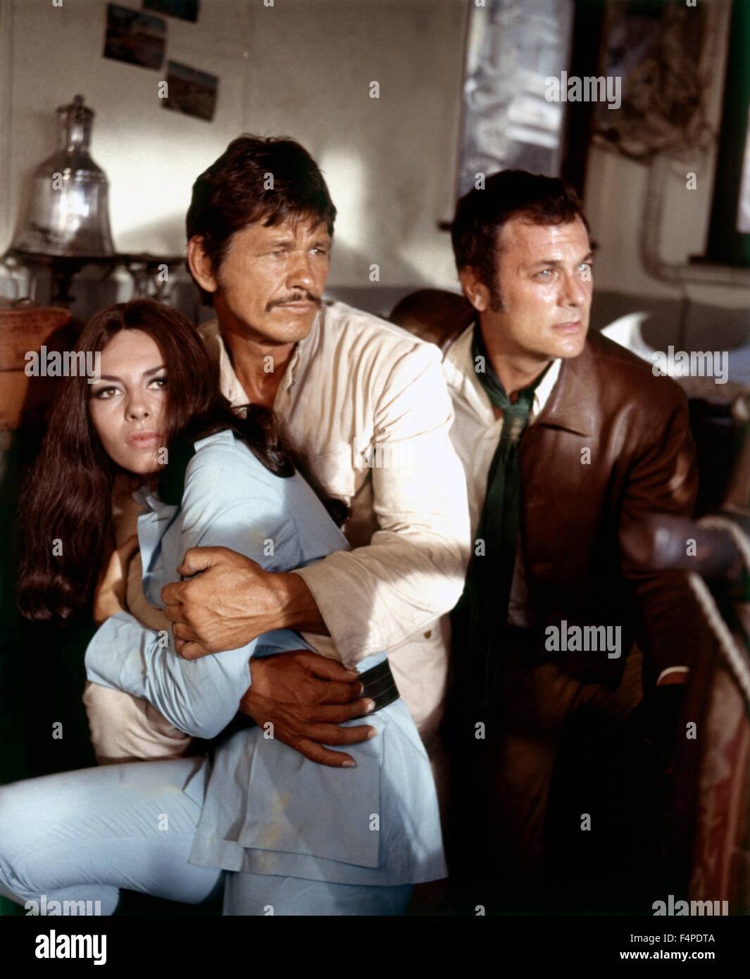 Charles Bronson Tony Bronson Tony Curtis, Charles Bronson, Michele Mercier / You Can't Win 'Em All 1970 directed by Peter Collinson Stock Photo - Alamy
