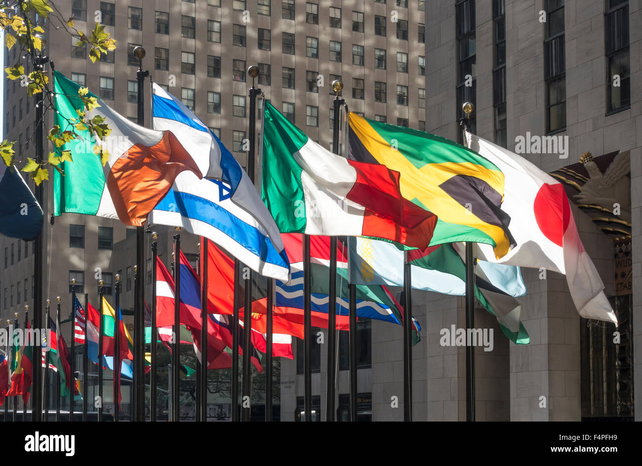 National flags flying in Rockefeller Center Stock Photo - Alamy