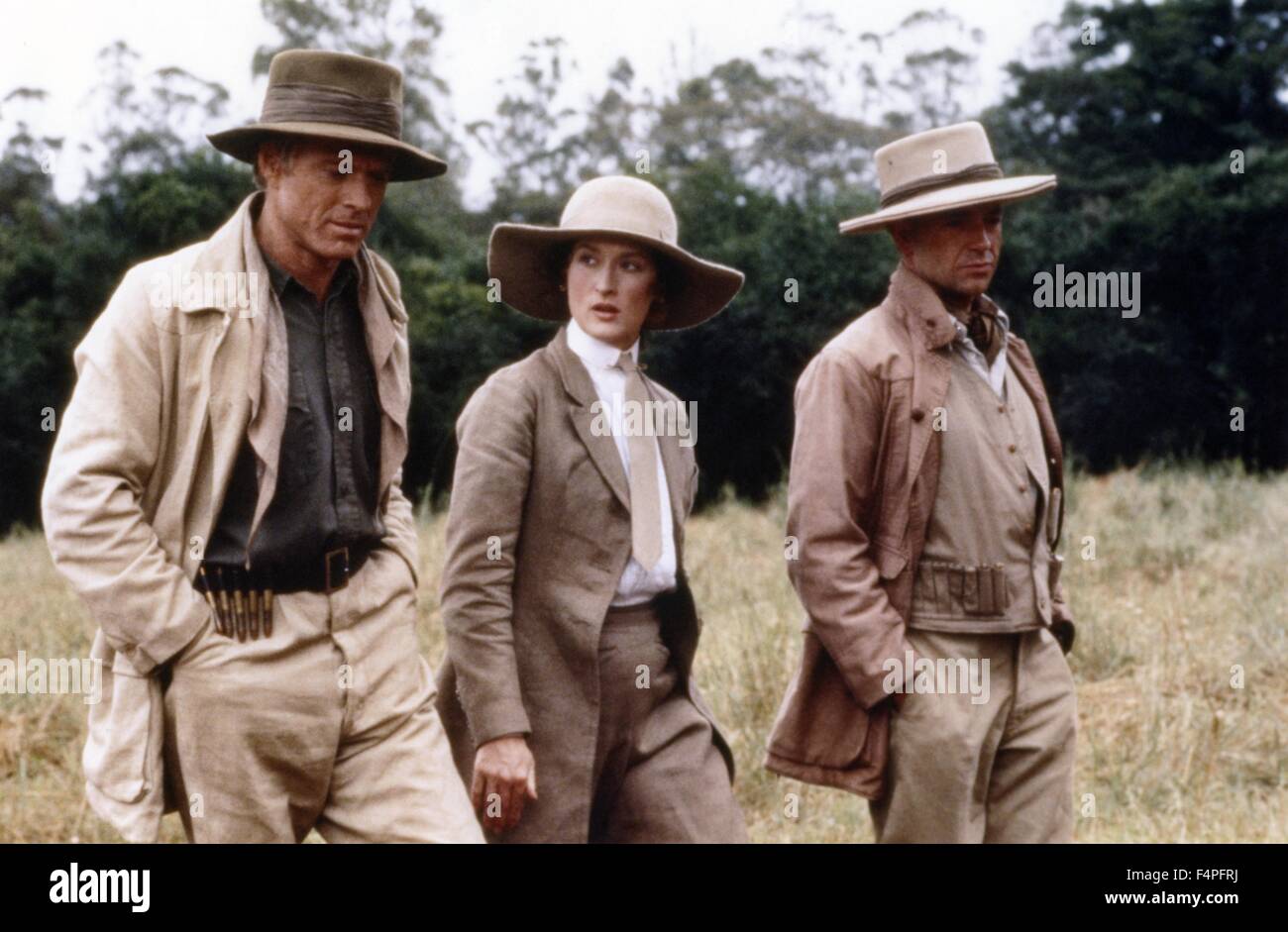 Robert Redford, Meryl Streep and klaus-Maria Brandauer / Out of Africa / 1986 directed by Sydney Pollack Stock Photo