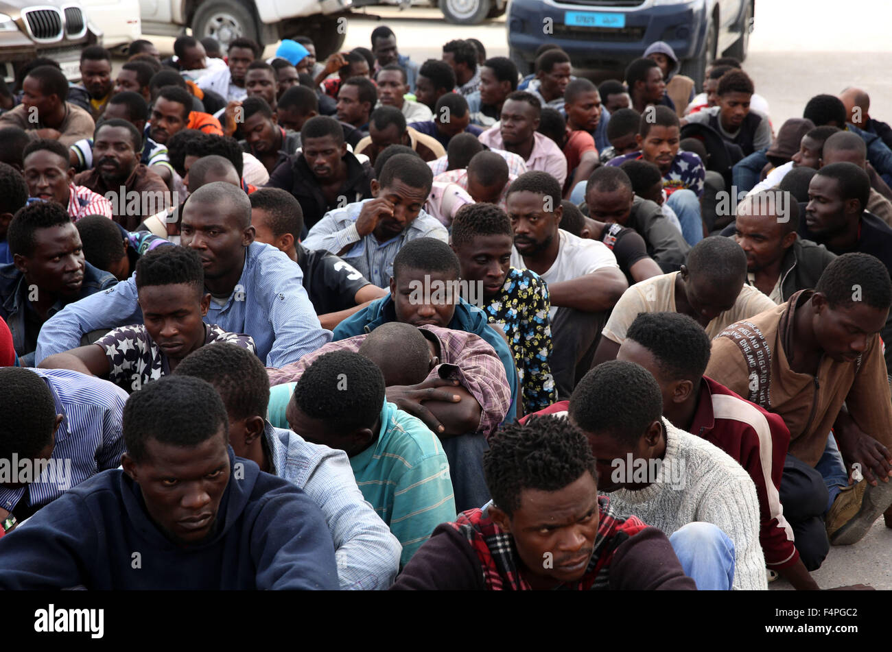 Tripoli. 21st Oct, 2015. 130 illegal immigrants who were intercepted by Libyan coast guards off Tripoli coast are seen in Libya on Oct. 21, 2015. Credit:  Hamza Turkia/Xinhua/Alamy Live News Stock Photo