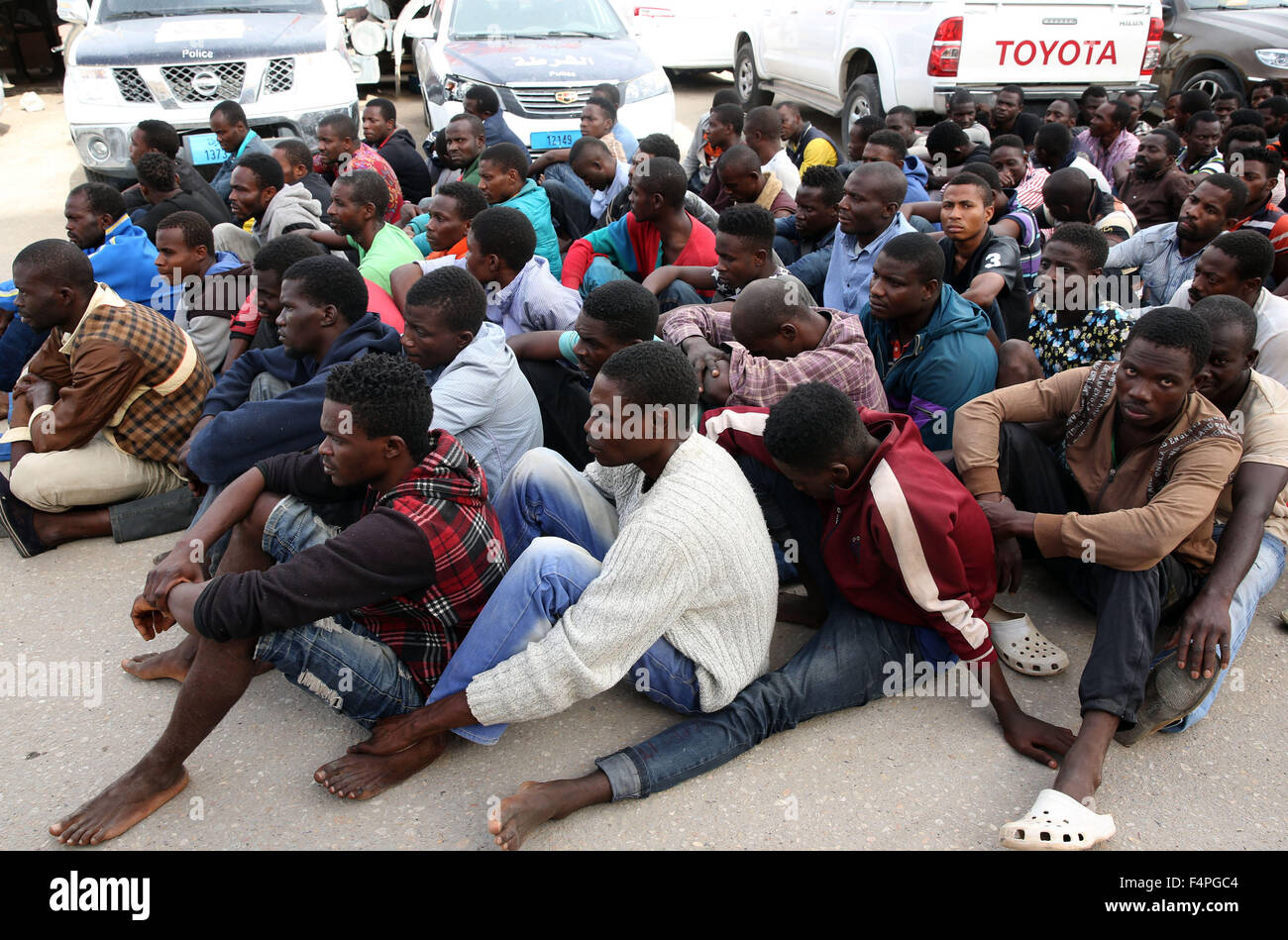 Tripoli. 21st Oct, 2015. 130 illegal immigrants who were intercepted by Libyan coast guards off Tripoli coast are seen in Libya on Oct. 21, 2015. Credit:  Hamza Turkia/Xinhua/Alamy Live News Stock Photo