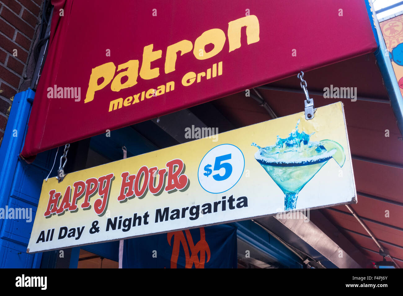 Happy Hour sign outside Patron Mexican grill in New York City Stock