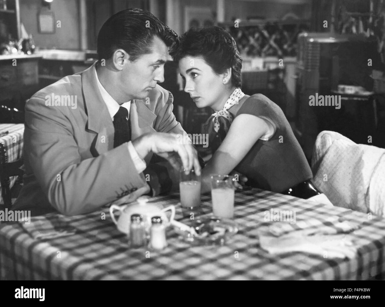 Robert Mitchum and Jean Simmons / She Couldn't Say No / 1954 directed by  Lloyd Bacon [R.K.O. Radio Picture] Stock Photo