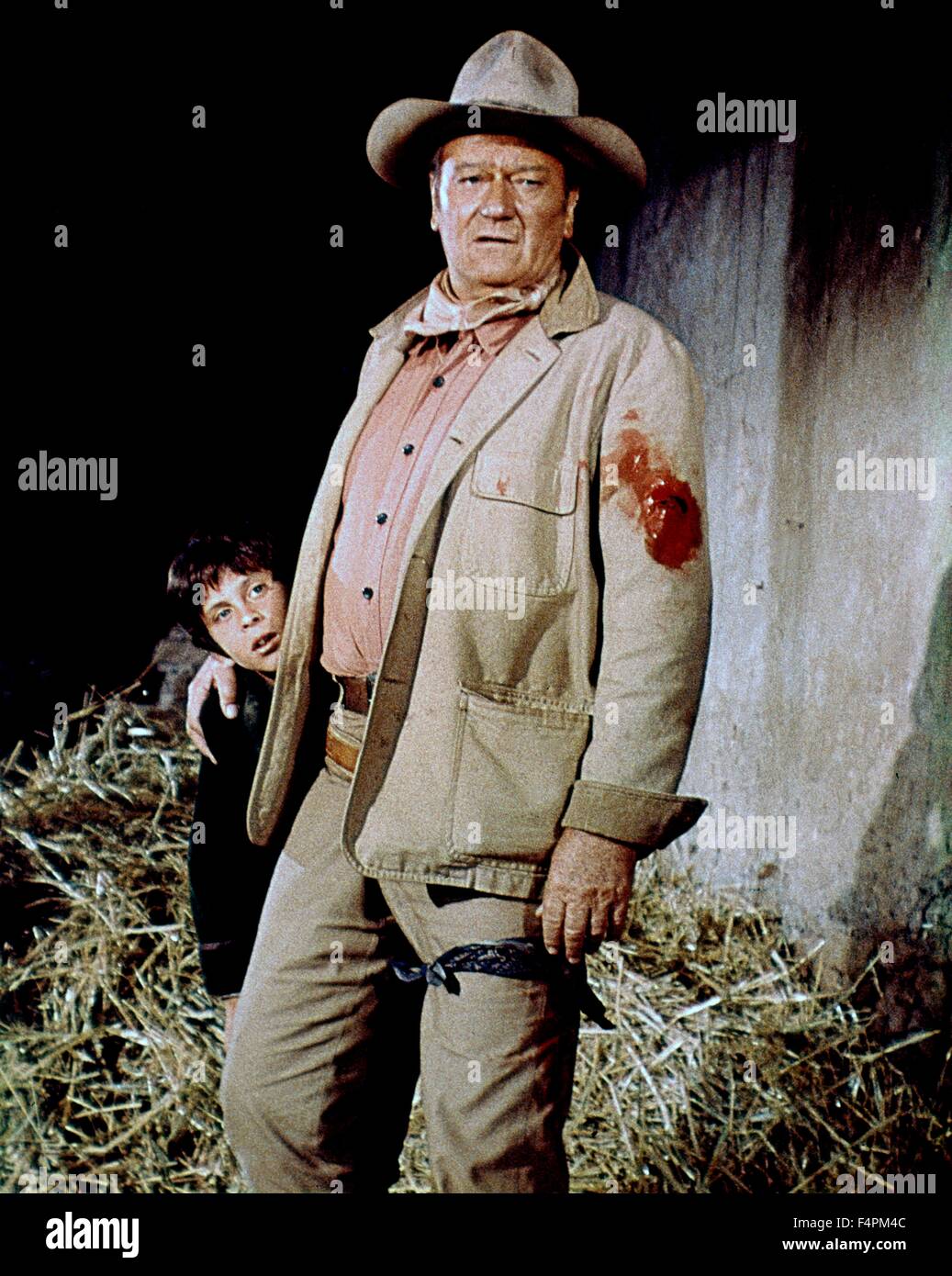 Ethan Wayne and John Wayne / Big Jake / 1971 directed by George Sherman [Twentieh Century Fox] Stock Photo