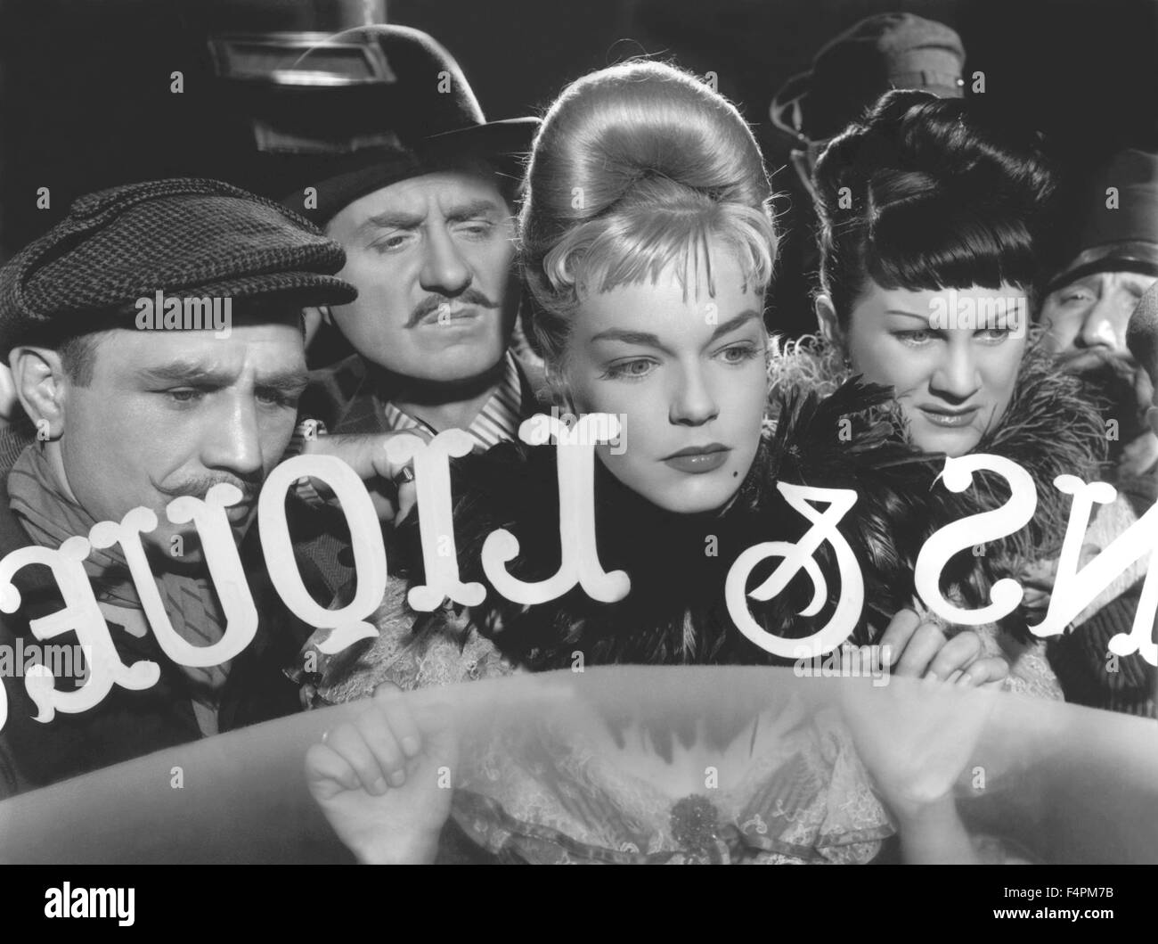 Claude Dauphin, Simone Signoret and Dominique Davray / Casque d'or / 1951 directed by Jacques Becker Stock Photo