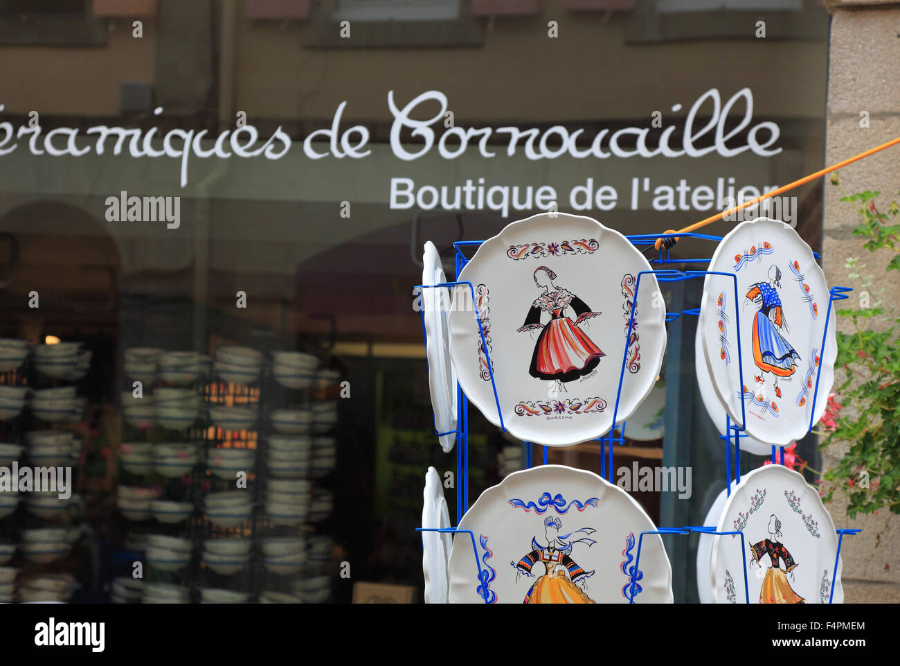 France, Brittany, Quimper, Souvenir shop in the old town, ceramic, painted plates Stock Photo