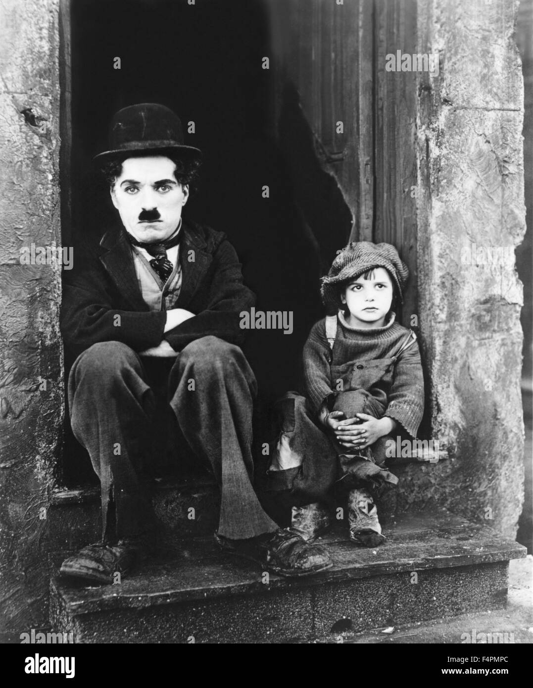 Jackie Coogan and Charles Chaplin / The kid / 1921 directed by Charles  Chaplin [A First National] Stock Photo - Alamy