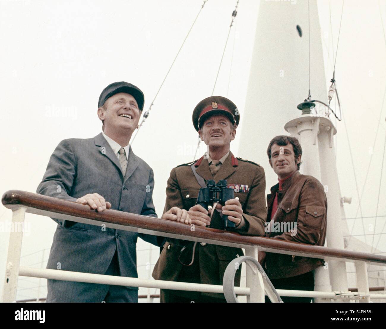 Andre Bourvil, David Niven and Jean-Paul Belmondo / The Brain / 1969  directed by Gerard Oury Stock Photo - Alamy
