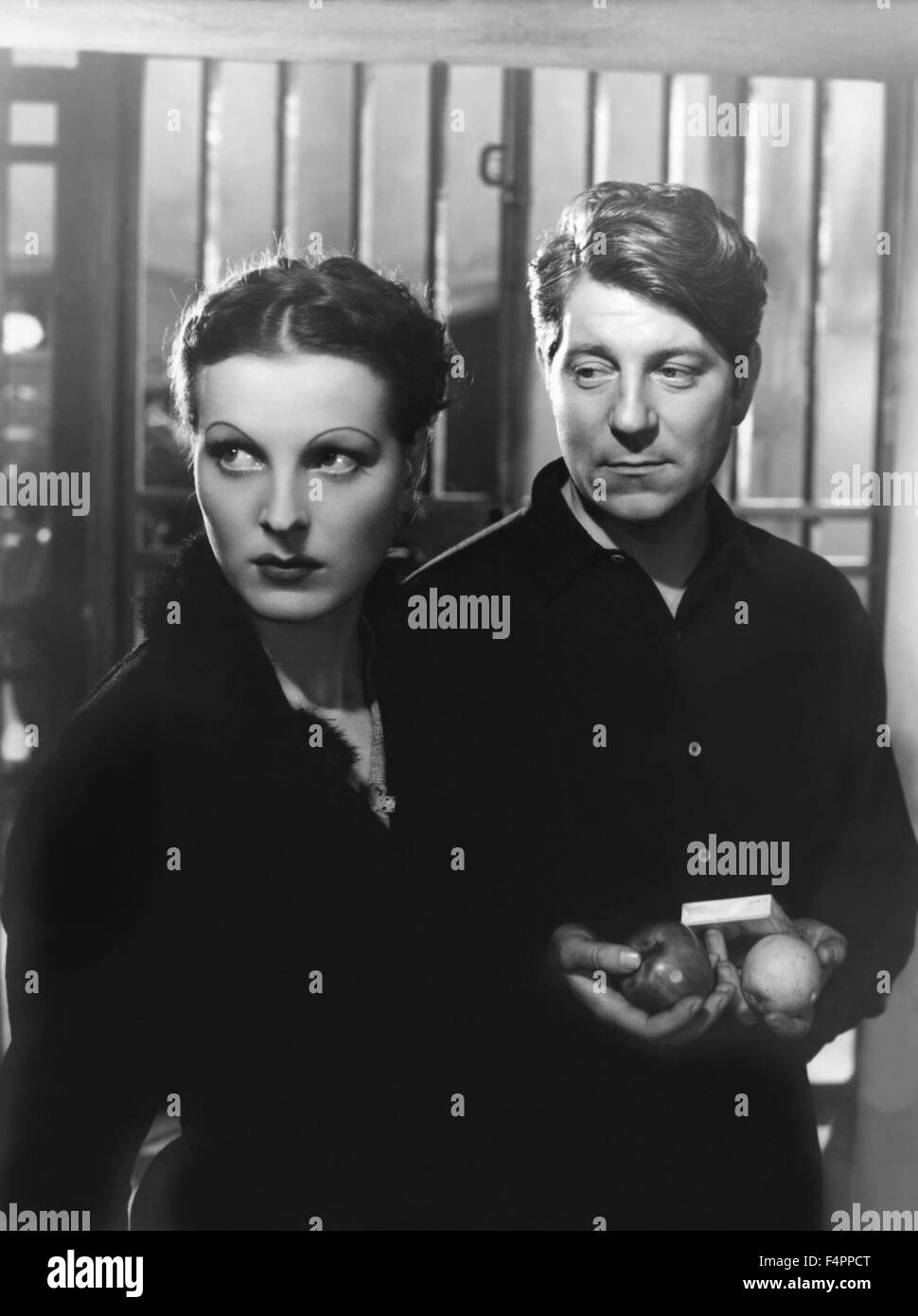 Junie Astor and Jean Gabin / Underworld / 1936 directed by Jean Renoir Stock Photo