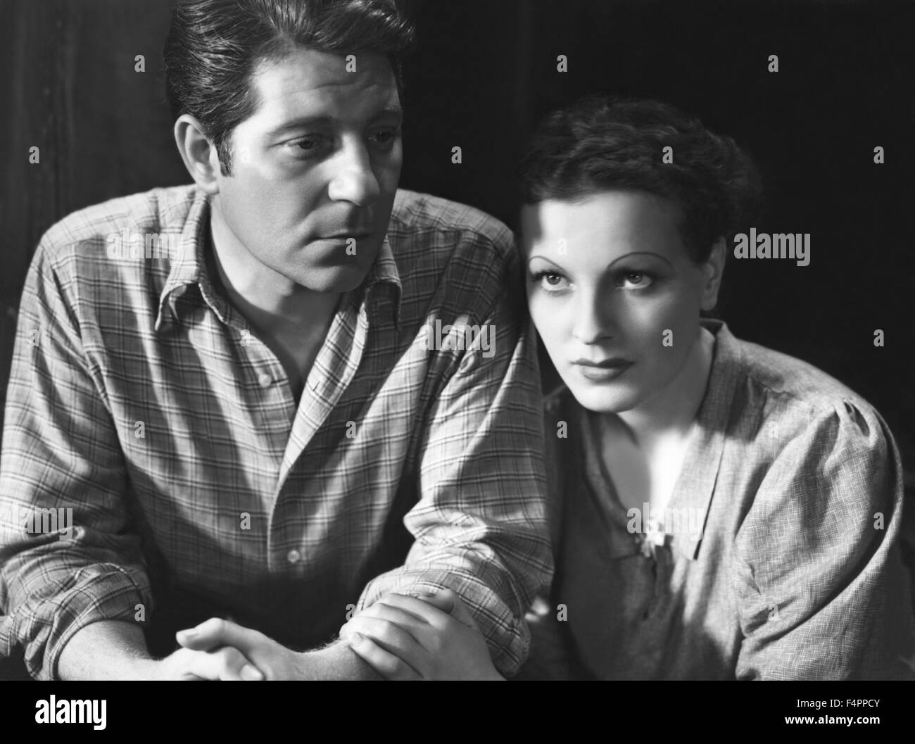 Jean Gabin and Junie Astor / Underworld / 1936 directed by Jean Renoir Stock Photo