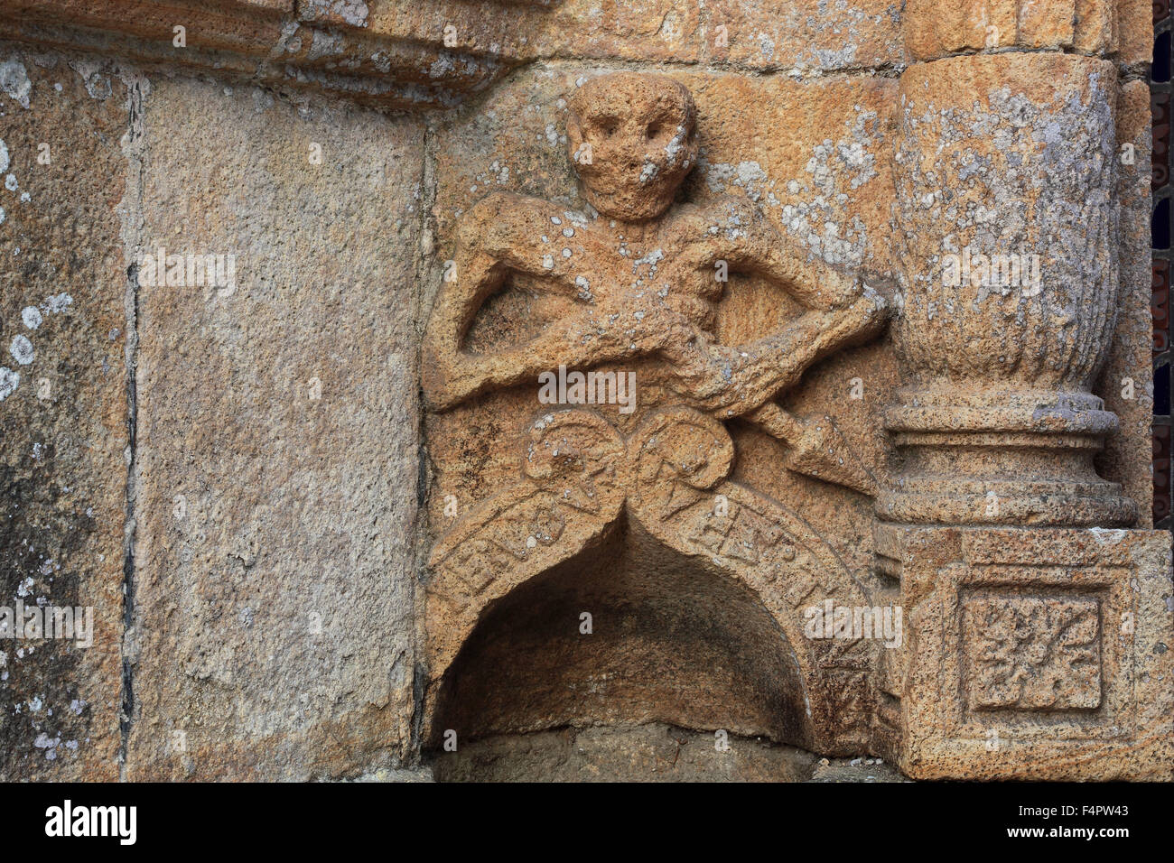 France, Brittany, walled parish of the church La Roche Maurice, Sculpture death on the ossuary, Ankou sur l'ossuaire Stock Photo