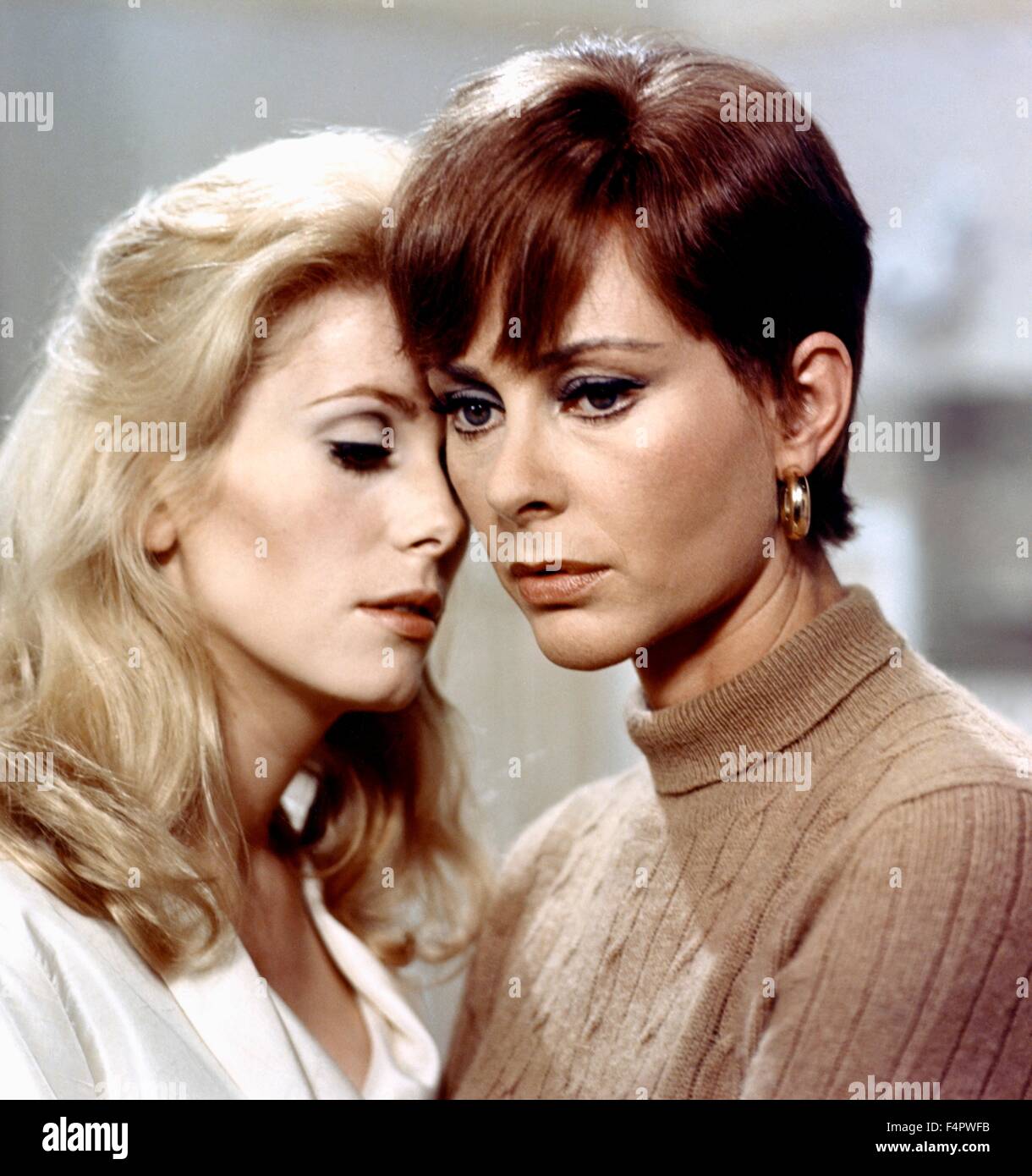 Catherine Deneuve and Genevieve Page / Belle de jour / 1966 directed by Luis Bunuel Stock Photo