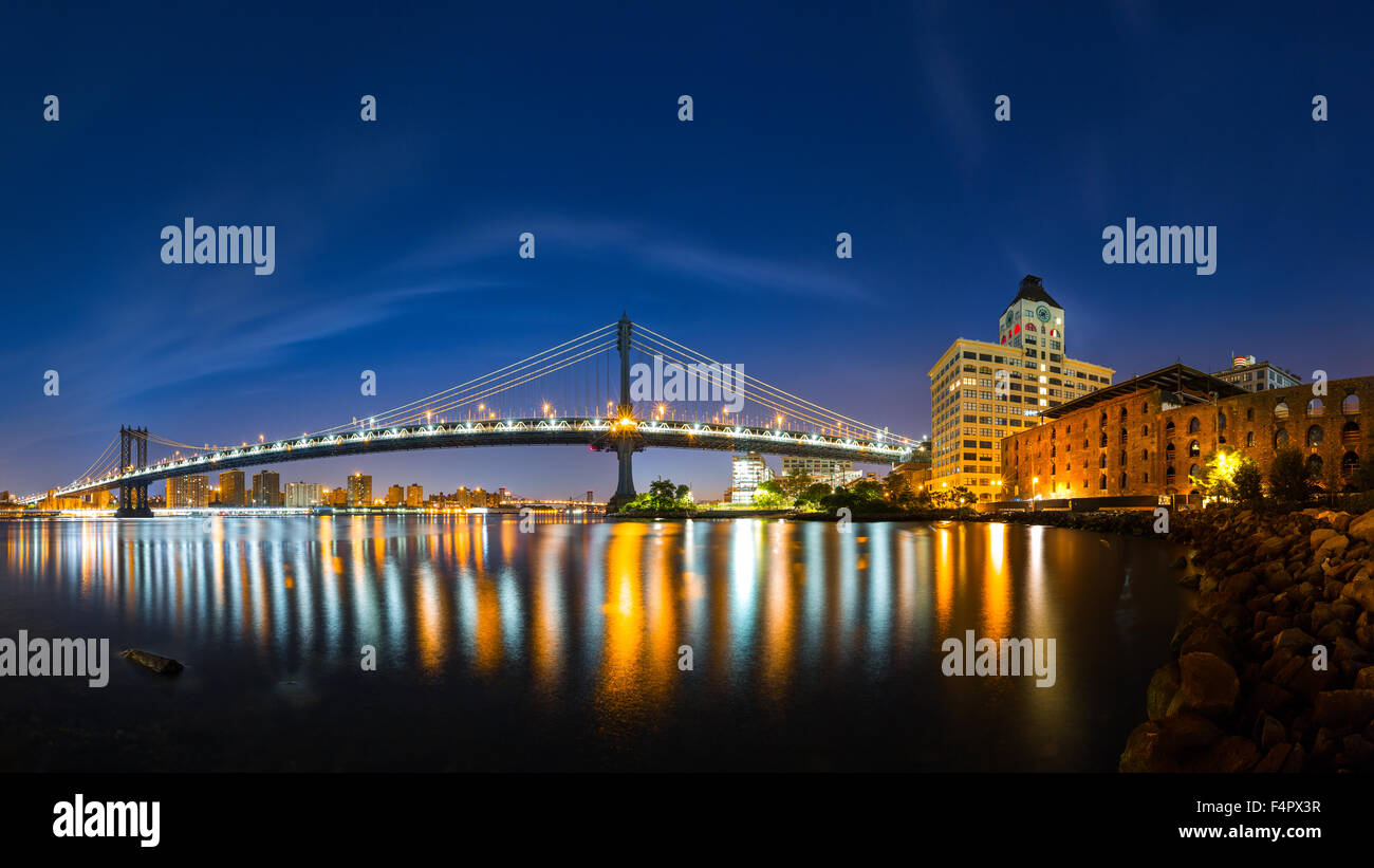 Manhattan Bridge panorama at dawn, viewed from Brooklyn Bridge park Stock Photo