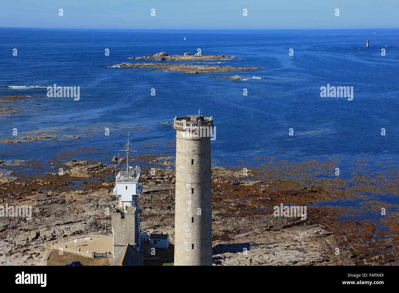 France, Brittany, view from the lighthouse Phare Echmuehl auf das Leuchtfeuer Vieille tour, den Phare de Penmarch Calvary and da Stock Photo