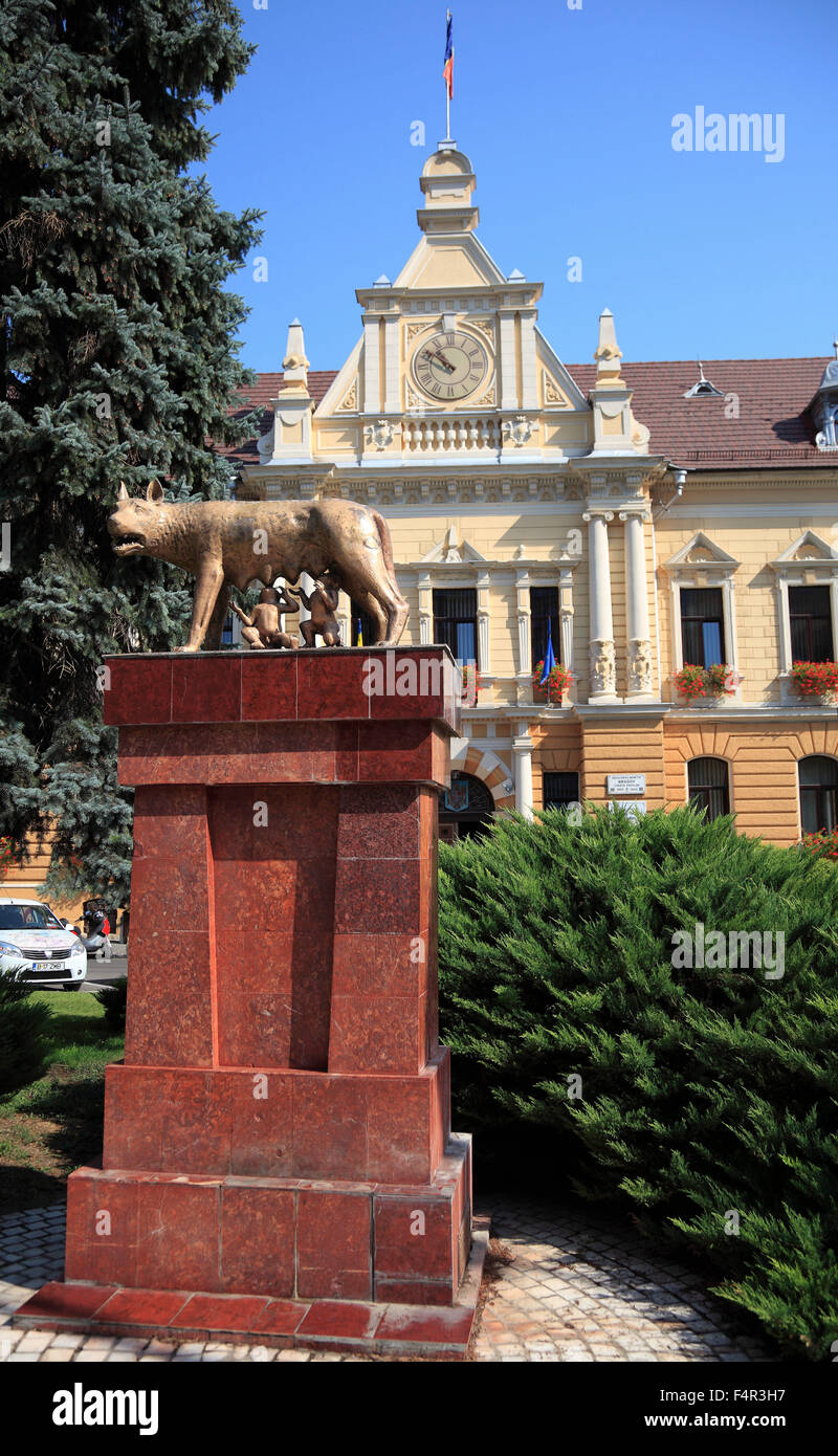 Monument The Capitoline Wolf suckles the boys, Romulus and Remus at the City Hall of Brasov, Brasov, Transylvania, Romania Stock Photo