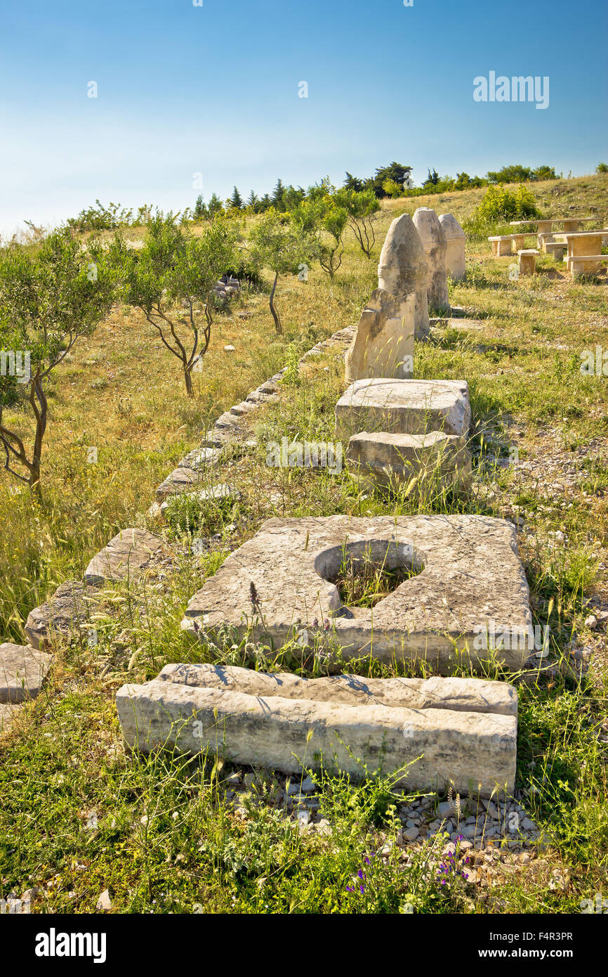 Stone artifacts of ancient town of Asseria in Croatia Stock Photo