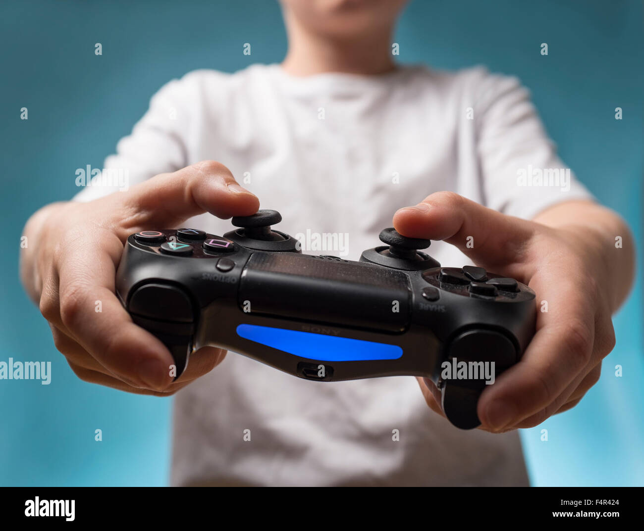 Young People Playing Video Games At Home Stock Photo, Picture and Royalty  Free Image. Image 113583143.