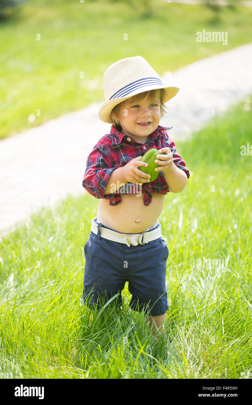 happy cute boy in the garden Stock Photo - Alamy