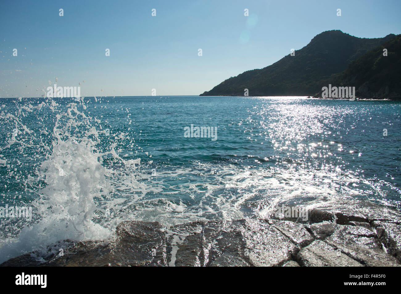 Italy, Europe, Sardinia, Costa Rei, Cala Sinizias, coast, rock, cliff, sea, wave, surf, foam Stock Photo