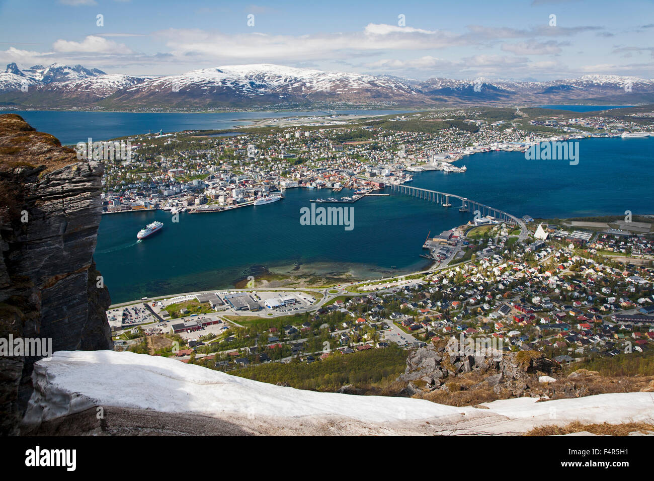 Norway, Troms, Nord-Troms, Tromso, city, port, aerial, snow, bridge, landscape, sea, mountains, panorama Stock Photo