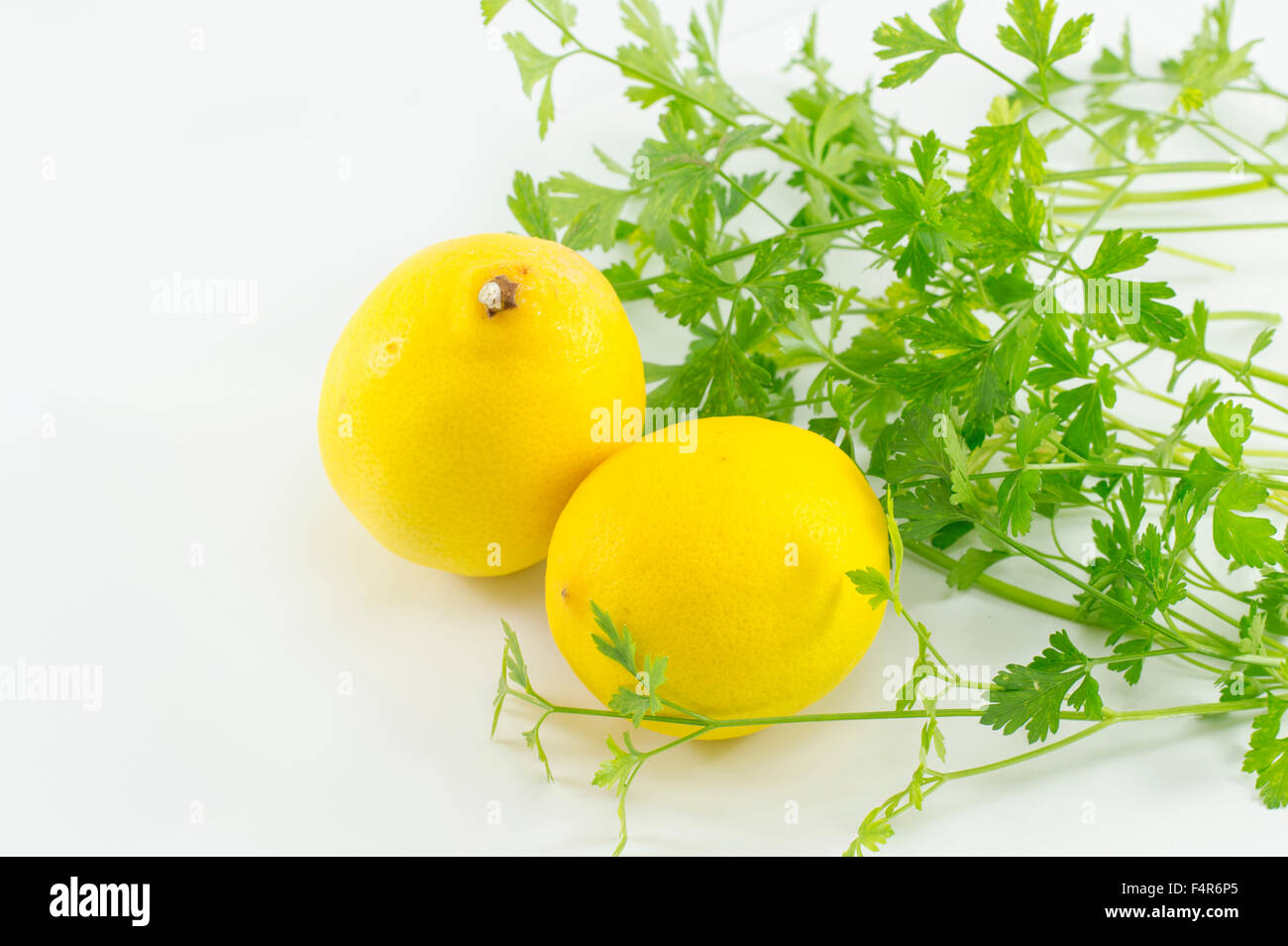 Lemons and parsley. Healthy lifestyle abstract Stock Photo