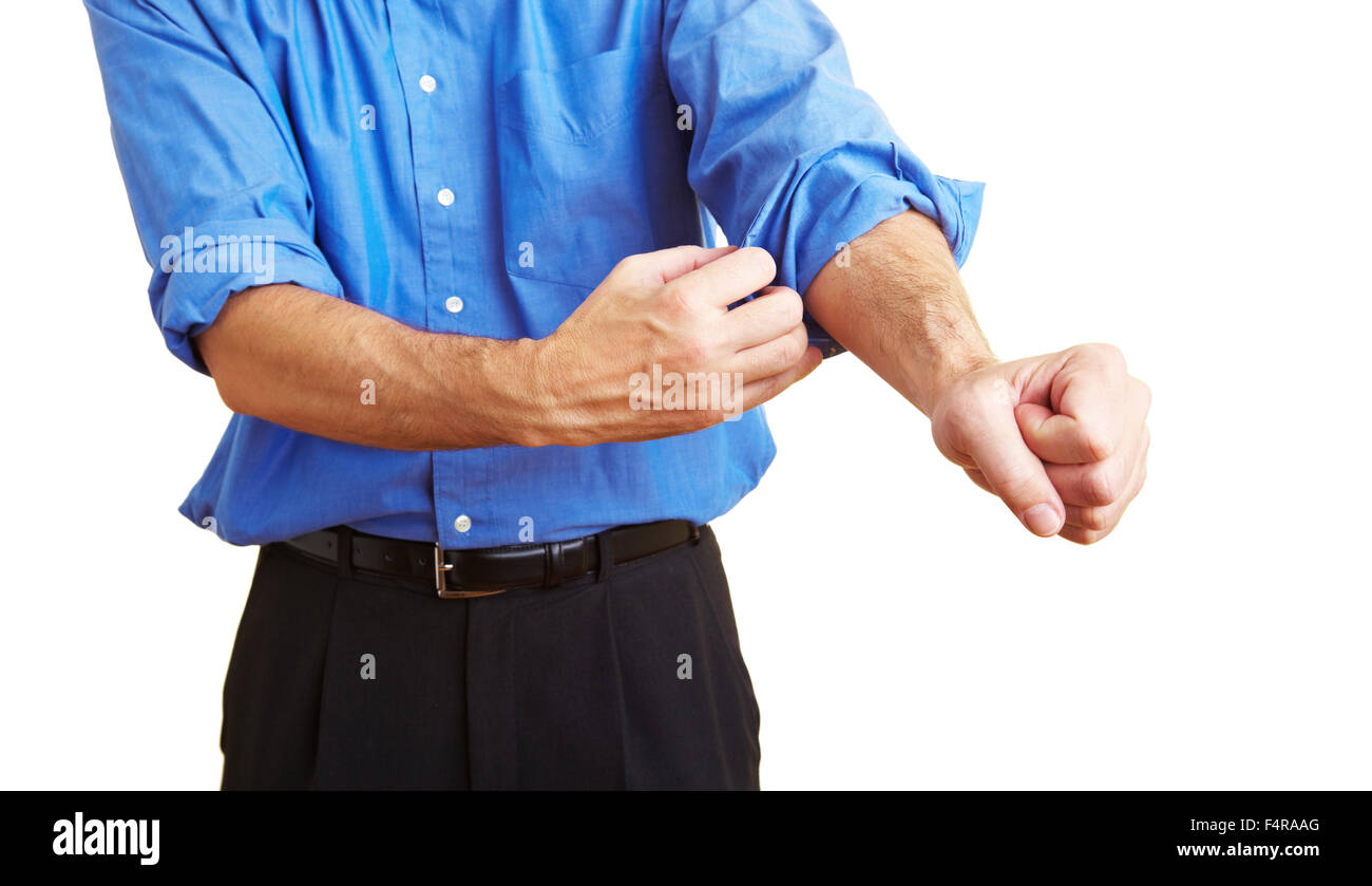 Senior man rolling up sleeve hires stock photography and images Alamy