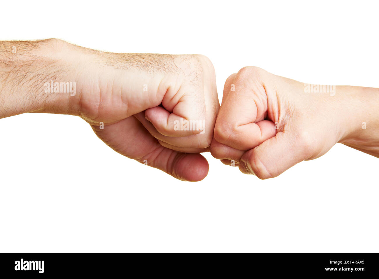 Two fists punching each other Stock Photo