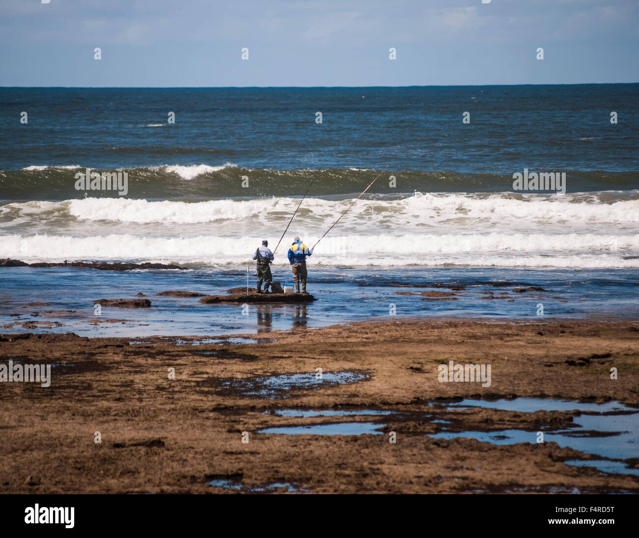 2 fisherman on the Witsand beach Stock Photo