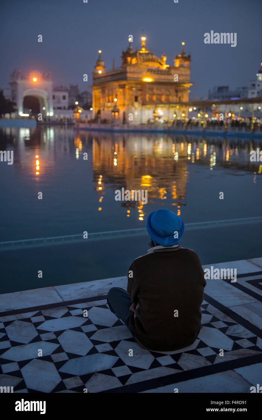 Asia, India, Amritsar, Punjab, Golden Temple, Sikh, shrine, holy, religion, pilgrim, night, vertical Stock Photo