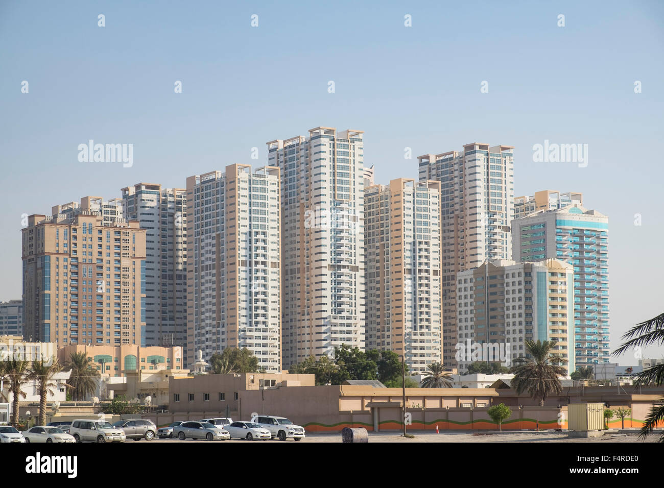 View of modern high-rise residential apartment blocks in Ajman Emirate in United Arab Emirates Stock Photo