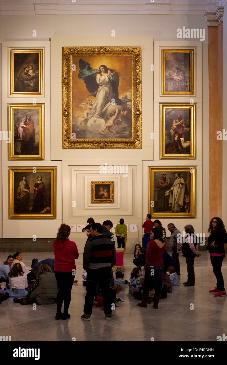 Tourists and visitors admire paintings, by  Bartholomew Murillo, Museum of Fine Arts, Seville, Andalucia, Spain, Europe Stock Photo