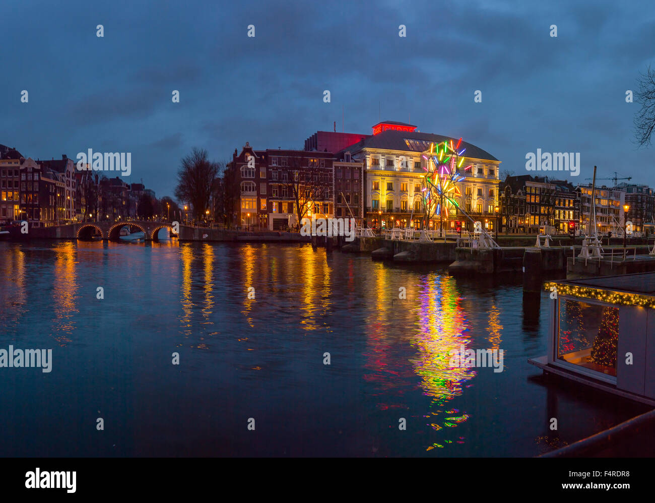 Netherlands, Holland, Europe, village, water, winter, night, evening, dusk, Illumination, Carre theatre, river, Amstel, Amsterda Stock Photo