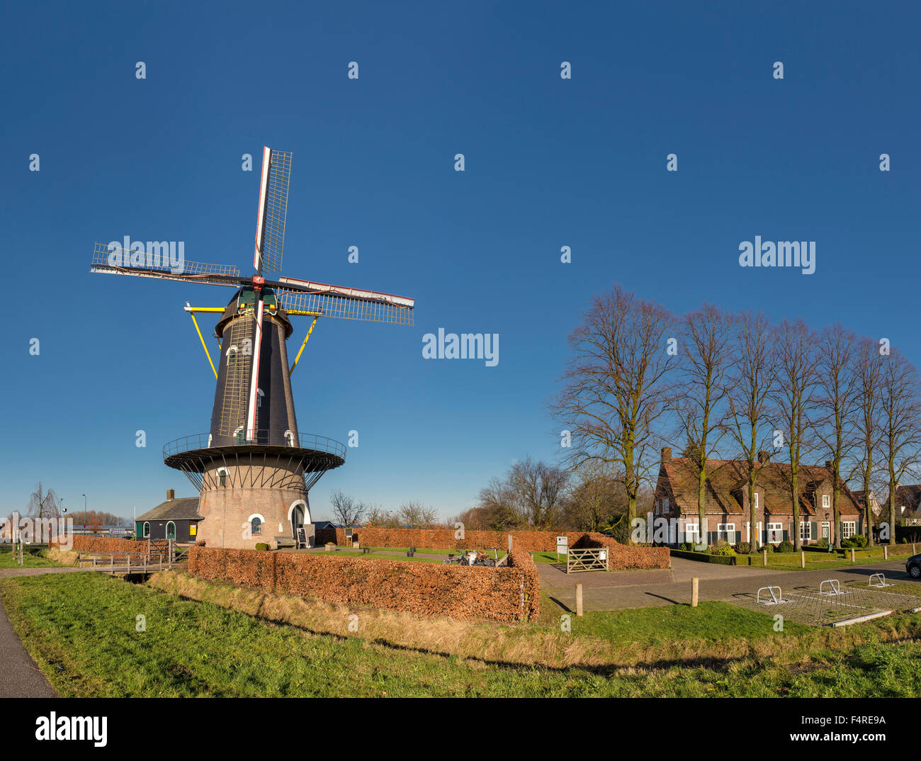Netherlands, Holland, Europe, windmill, city, village, forest, wood, trees, winter, Tower mill, Kerkhovense molen, Oisterwijk, B Stock Photo