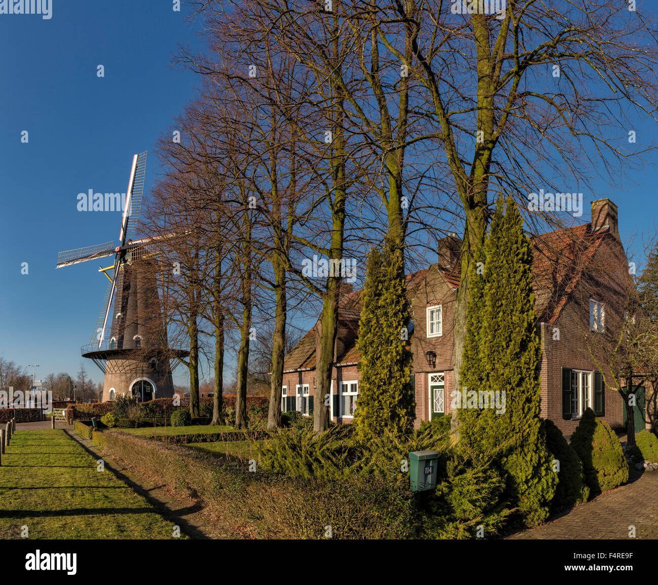 Netherlands, Holland, Europe, windmill, city, village, forest, wood, trees, winter, Tower mill, Kerkhovense molen, Oisterwijk, B Stock Photo