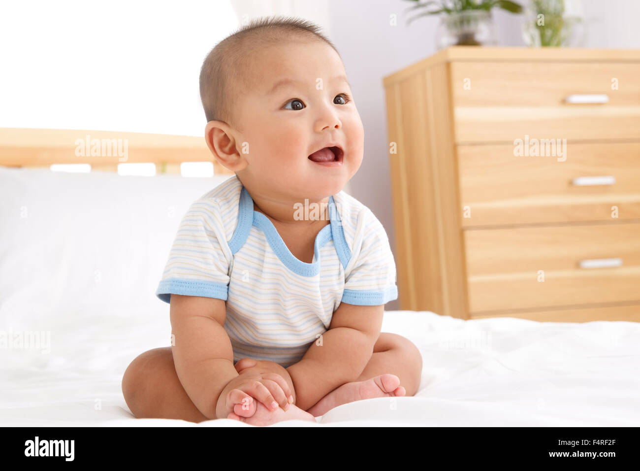 Boy asian barefoot home hi-res stock photography and images - Alamy