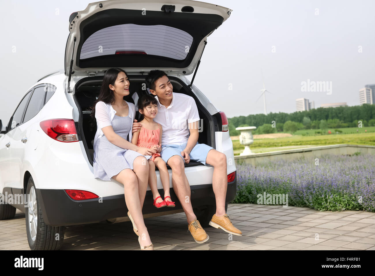 A happy family of three outdoor picnic Stock Photo