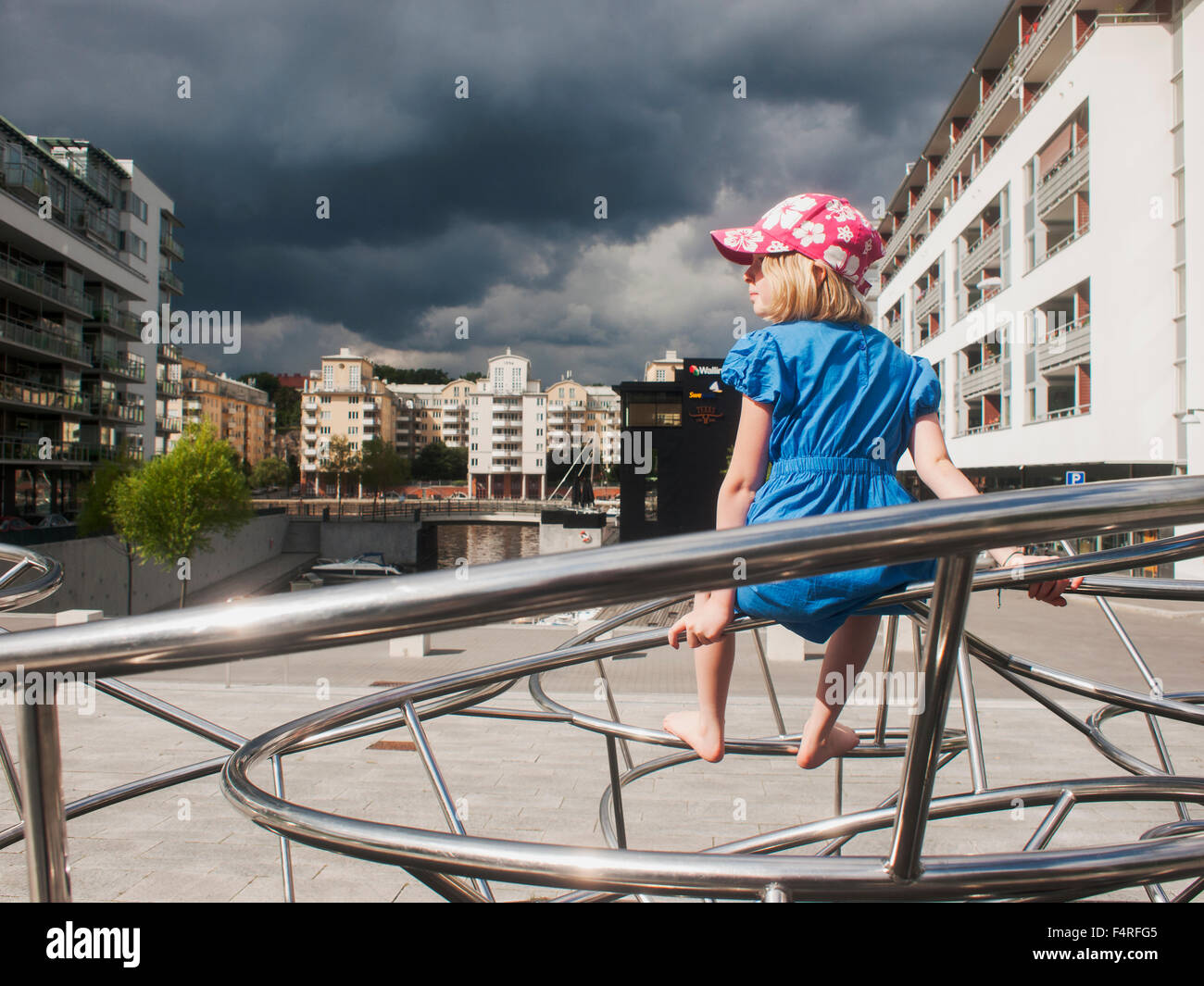 Girl sitting on top hi-res stock photography and images - Alamy