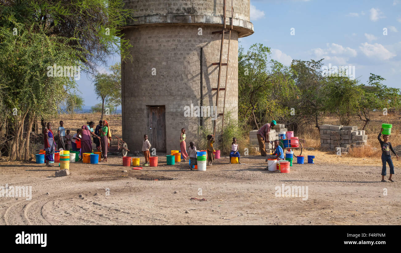 Africa, children, people, persons, travel, Tanzania, water, water tower Stock Photo